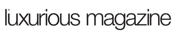 Logo with the text "luxurious magazine" in sleek, lowercase, sans-serif font.