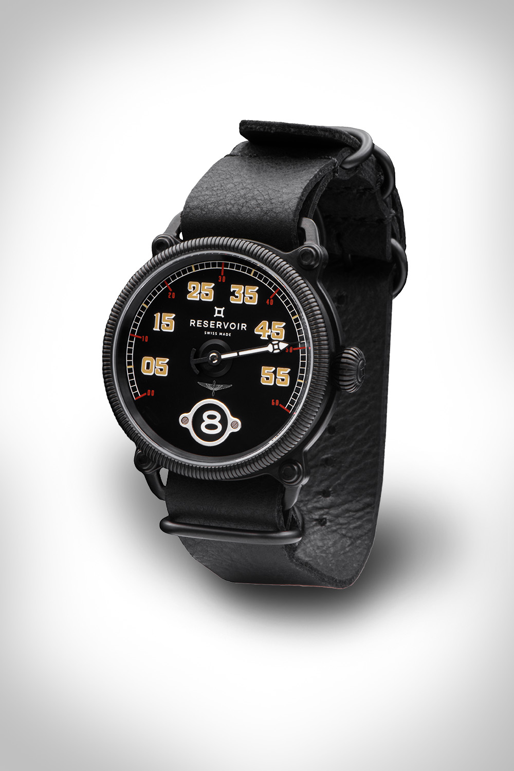 Black leather watch with round black dial, large white numerals, subdial, "Reservoir" brand.