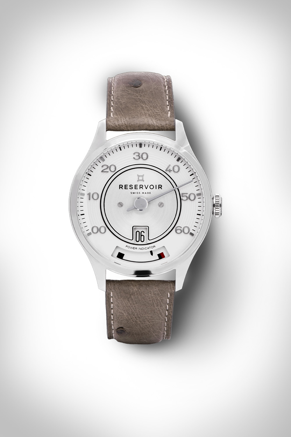 Luxury wristwatch with white dial, date display, power reserve, brown leather strap.