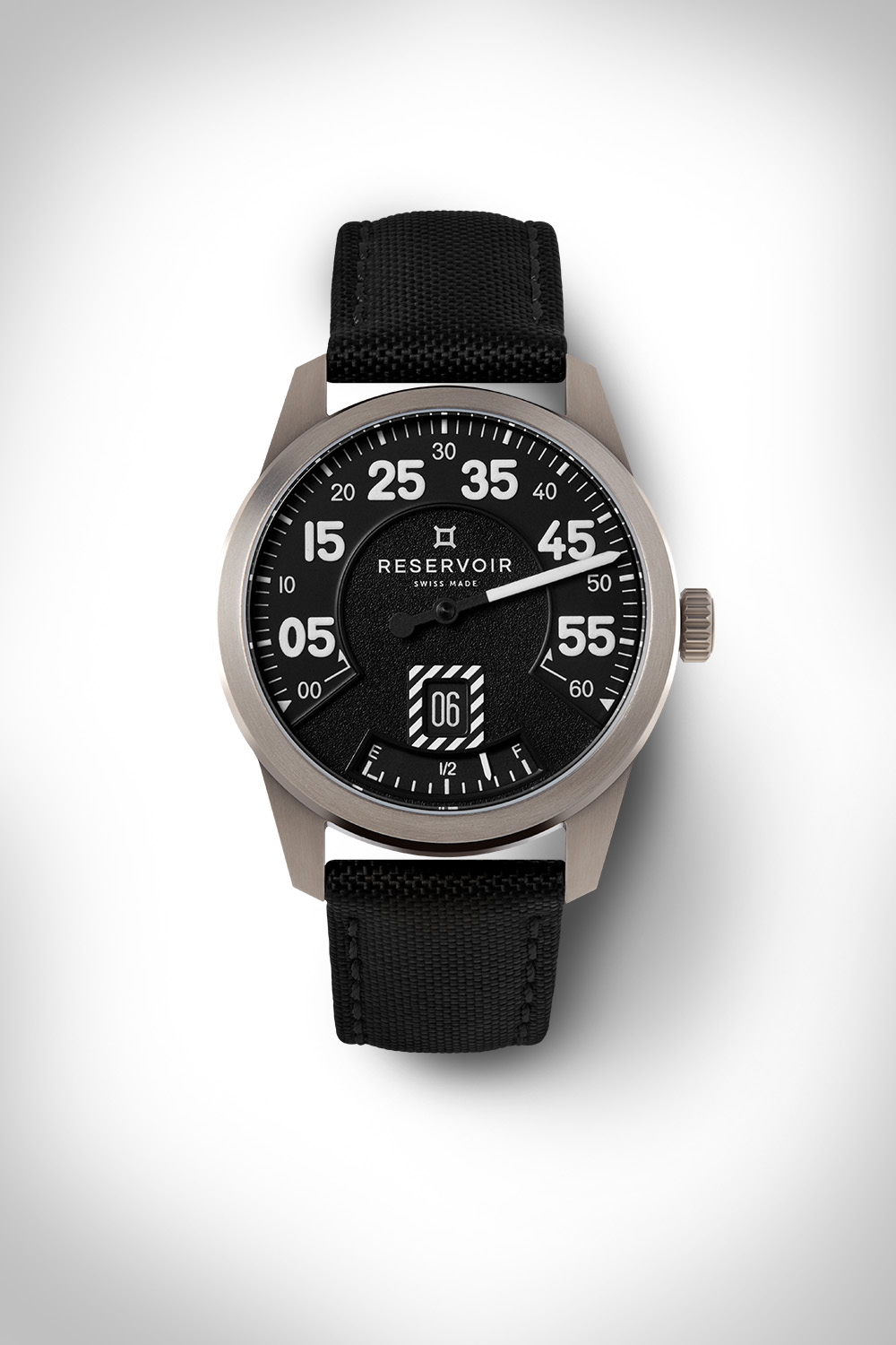 Reservoir wristwatch, black dial, white numerals, metal case, black strap, date display.