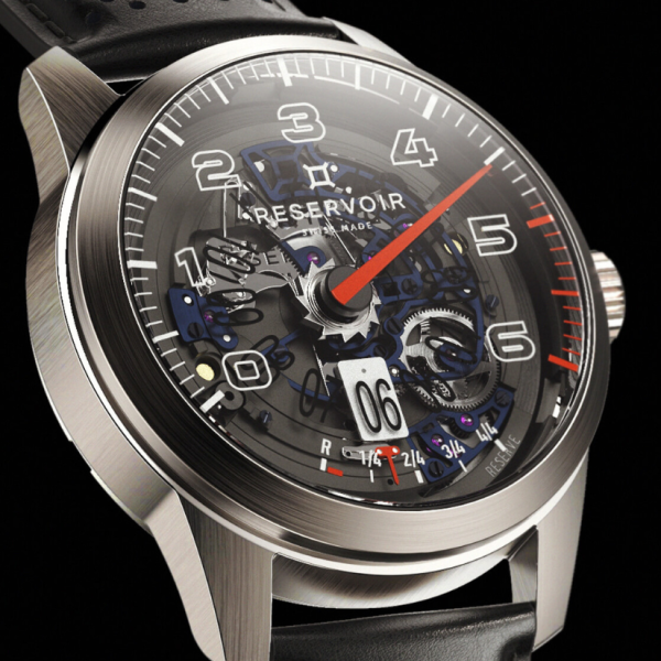 Metallic wristwatch with black leather strap, exposed mechanics, red hand, date indicator, and "Swiss Made".