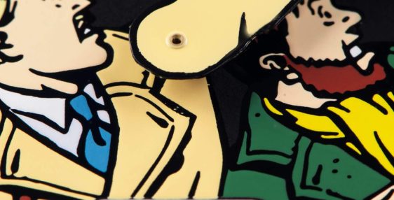 Watch face close-up with "Reservoir Swiss Made," animated characters, and number "6" on black dial.