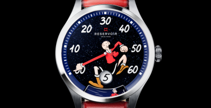 Wristwatch with a cartoon character on the dial, red band, white numerals, and numeric window.