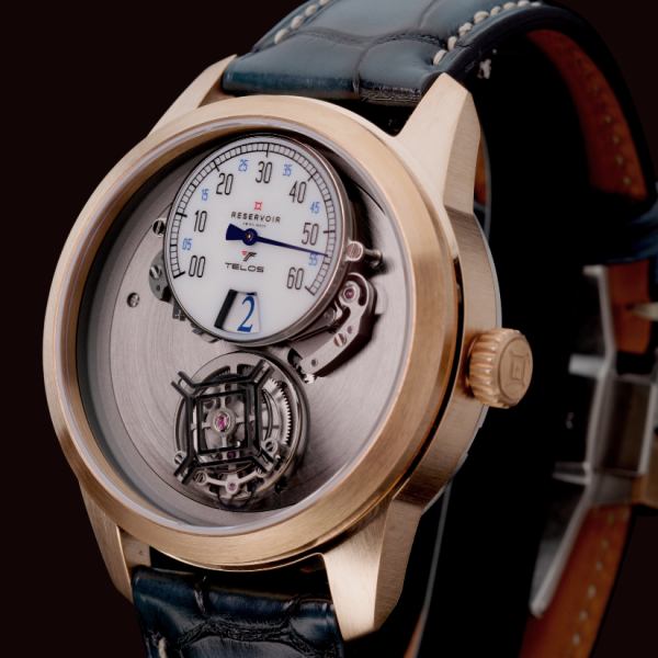 Gold-toned wristwatch with white dial, black/blue numbers, tourbillon, black leather strap.