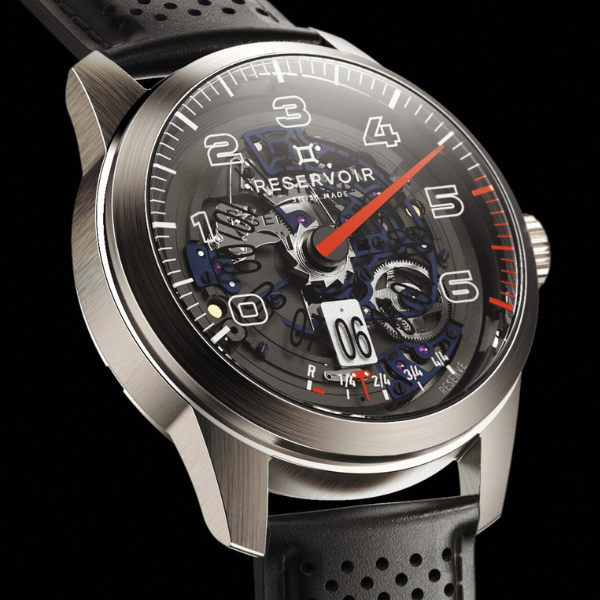 Wristwatch with metallic case, black leather strap, transparent face revealing mechanics, red hand.