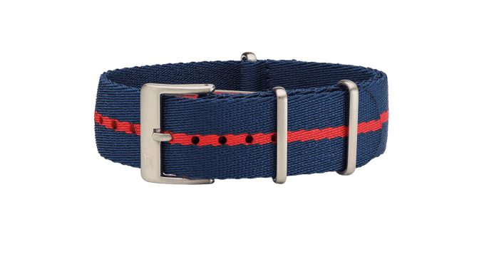Navy blue fabric watch strap with a red stripe, silver buckle, and adjustable holes.
