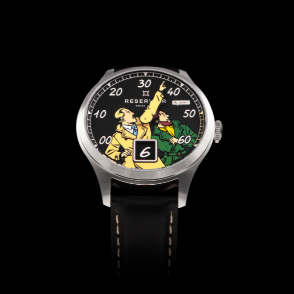 Wristwatch with black strap, cartoon dial design, numeric markings, "RESERVOIR" brand visible.