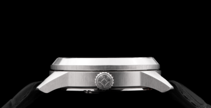 Sleek silver wristwatch with black straps against a black background, highlighting the side profile.