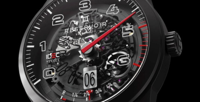 Sophisticated wristwatch with black dial, visible mechanics, white numerals, and prominent red hand.